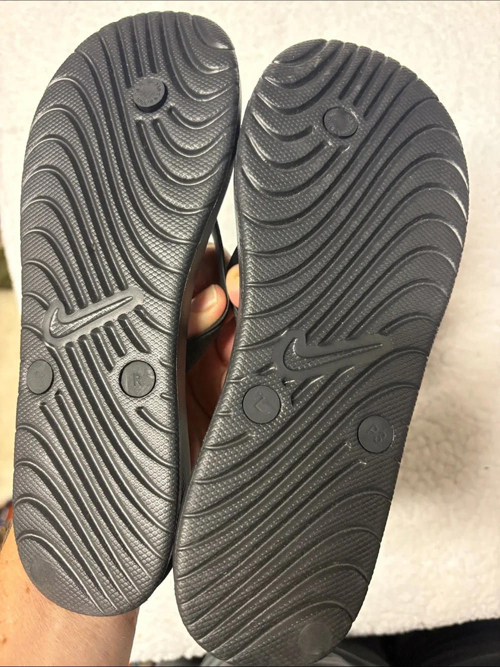 Nike size 3 All-Black Textured Thong Sandals